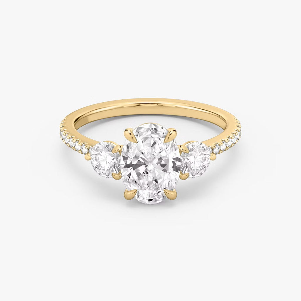 The Luxe Three – Oval & Round Diamond Ring in 14K Yellow Gold