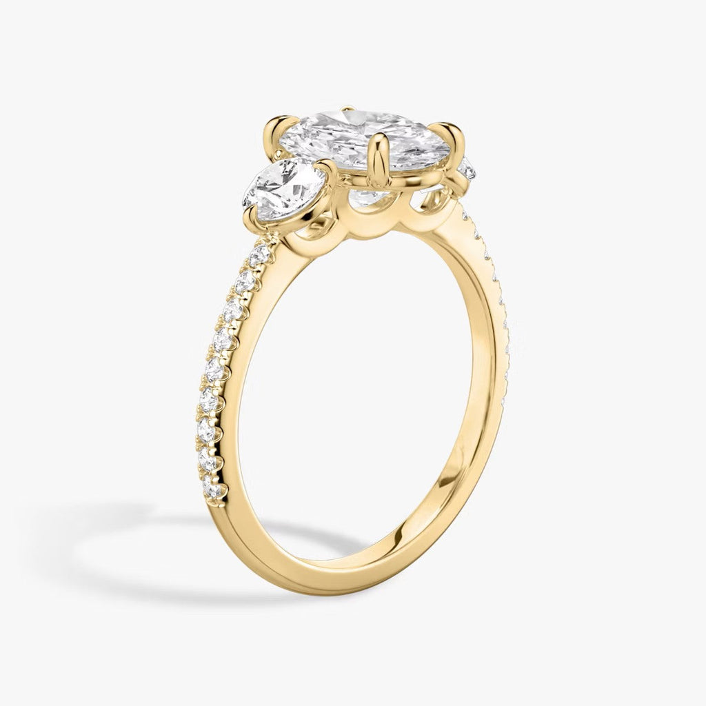The Luxe Three – Oval & Round Diamond Ring in 14K Yellow Gold