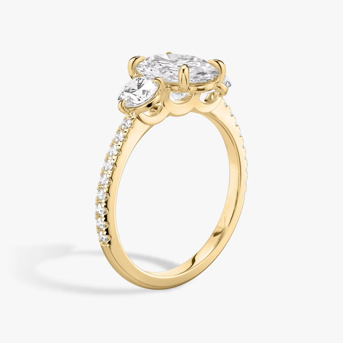 The Luxe Three – Oval & Round Diamond Ring in 14K Yellow Gold